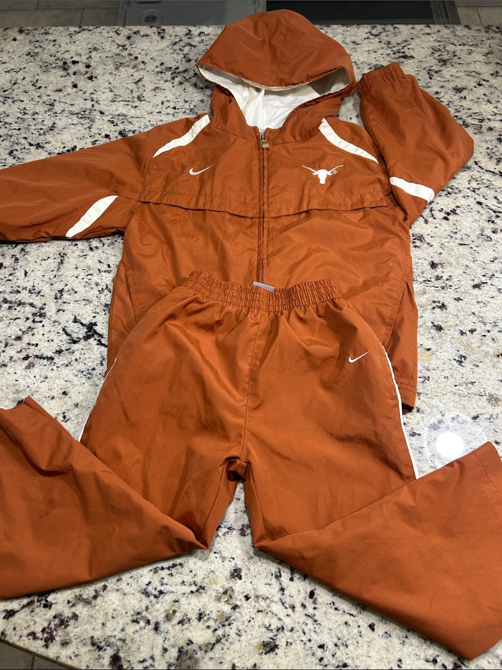 Nike Women's Orange Track Pants and Hooded Jacket Set with White Accents